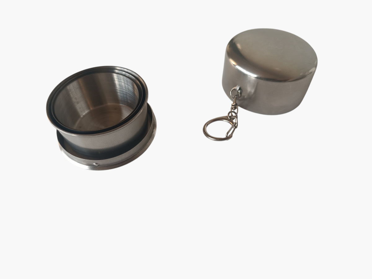 Campus Zone stainless steel collapsible travel cup shown open and closed with a keychain attachment on a white surface