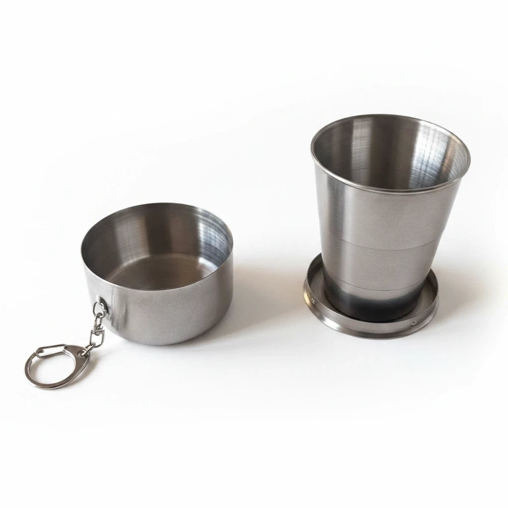 Campus Zone stainless steel collapsible travel cup with keychain, shown in both expanded and folded positions.