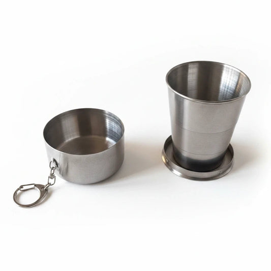 Campus Zone stainless steel collapsible travel cup with keychain, shown in both expanded and folded positions.