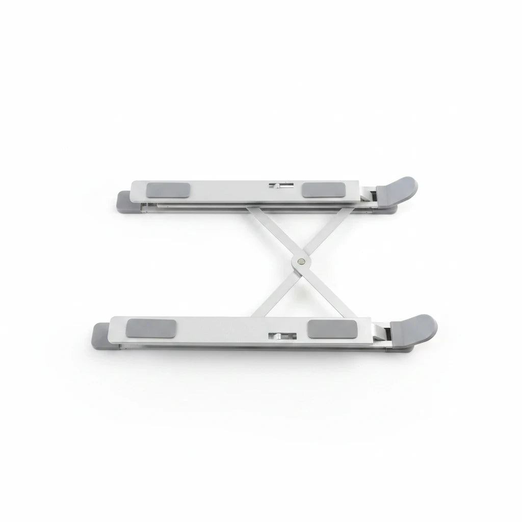 Campus Zone foldable silver aluminium laptop stand with X-brace mechanism and rubber grip pads on a white background