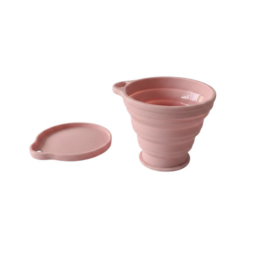 Campus Zone pink collapsible silicone travel cup with matching lid for hot or cold drinks on the go.