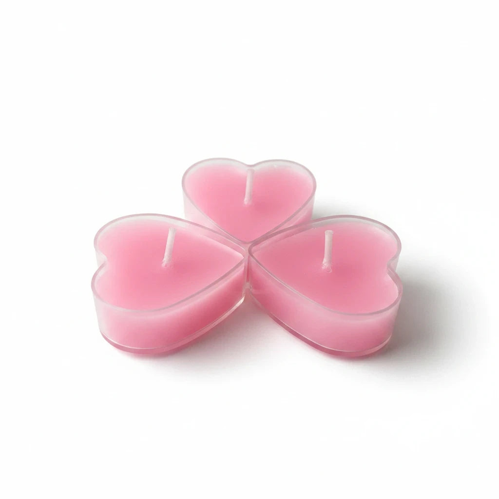Campus Zone pink heart-shaped tea light candles in clear plastic holders arranged in a cluster on a white background