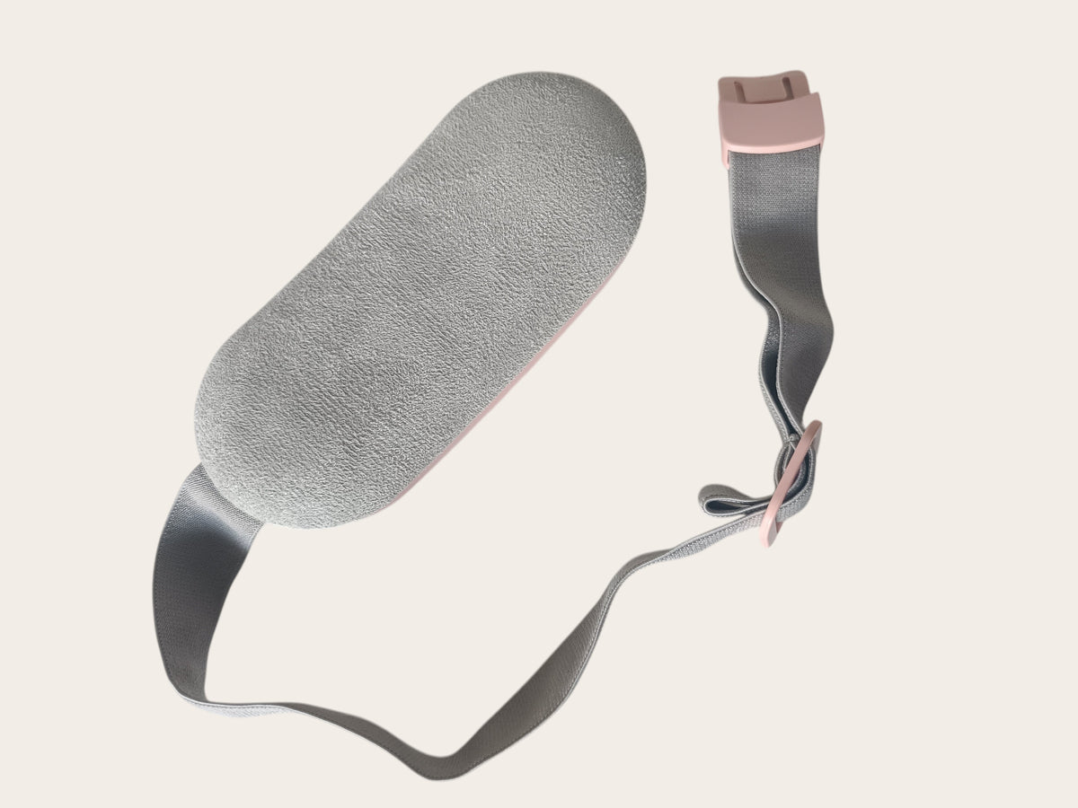 Campus Zone pink wearable menstrual heating pad with soft fabric surface and adjustable elastic strap for cramp relief